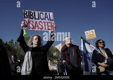 Jerusalem, Israel. 29th December, 2022. Activists assembled from around the country demonstrate outside the Knesset in Jerusalem against new Israeli government being sworn in to power inside Parliament. Benjamin Netanyahu, 73, will return to power leading what analysts describe as the most right wing, conservative and biased government in the country's history. Incoming government's coalition agreements represent a devastating blow to the cause of religious pluralism, equality in military service, laws against incitement to racism and human rights for the LGBTQ community and other minorities.