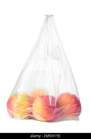 Red apples in a plastic bag isolated on a white background. Stock Photo