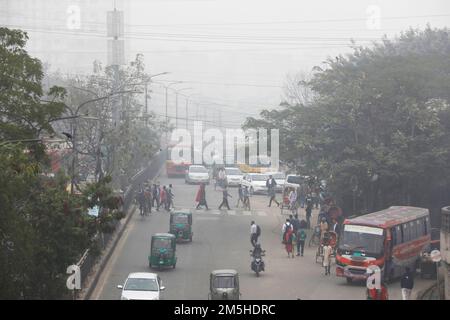 Dhaka, Bangladesh - December 28, 2022: Dhaka city is covered with thick fog in winter day. Stock Photo