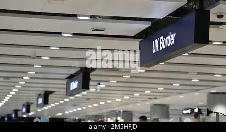 Passport control signs at Manchester airport as they cover for striking Border Force officers. Public and Commercial Services union (PCS) members working as Border Force officers at Gatwick, Heathrow, Birmingham, Cardiff, Manchester and Glasgow airports and the port of Newhaven resumed strikes on Wednesday for four days over pay, jobs and conditions. Picture date: Thursday December 29, 2022. Stock Photo