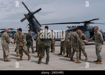 Airmen assigned to the 41st Rescue Squadron fly in an HH-60G Pave Hawk ...