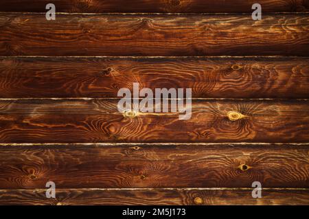 Dark toned wooden wall made of pine wood boards, background photo texture Stock Photo