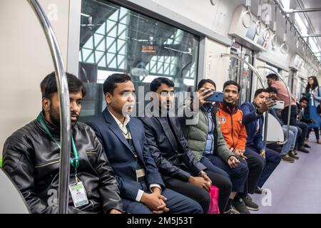 Passengers travel inside a Dhaka Metro train from Uttara North to Agargaon. Prime Minister Sheikh Hasina formally inaugurated the country's first metro rail. Stock Photo