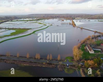 Muchelney Somerset, UK.  29th December 2022.  UK Weather.  View from the air of flooded fields on the Somerset Levels at Muchelney in Somerset after the River Parrett burst its banks after heavy rain.  Picture Credit: Graham Hunt/Alamy Live News Stock Photo