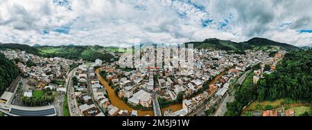 Panoramic aerial drone view of Manhuacu in Minas Gerais, Brazil, famous for coffee plantations Stock Photo