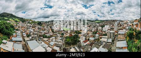 Panoramic aerial drone view of Manhuacu in Minas Gerais, Brazil, famous for coffee plantations Stock Photo