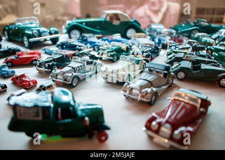 top view of model die cast toy cars in display case at the morgan car factory malvern worcestershire uk Stock Photo