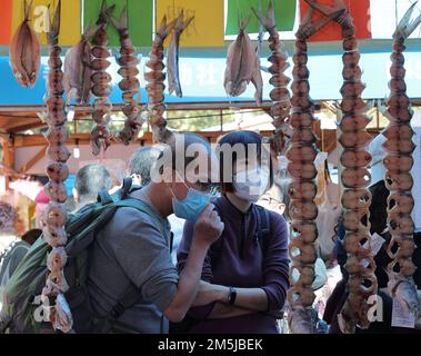 People visit the 17th FarmFest at Fa Hui Park in Mong Kok. FarmFest is the largest outdoor farmers' market in Hong Kong, and local producers can directly sell their products to consumers at the event. 26DEC22 SCMP / Jelly Tse Stock Photo