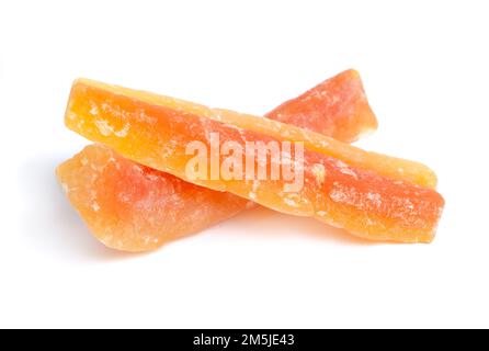 Dried Papaya pieces. Isolated on white background. Stock Photo