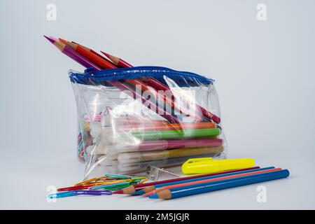 back to school pencil case and an assortment of pens pencils and staitonery Stock Photo