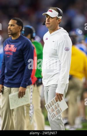 Mississippi head coach Lane Kiffin, left, talks with LSU head coach ...