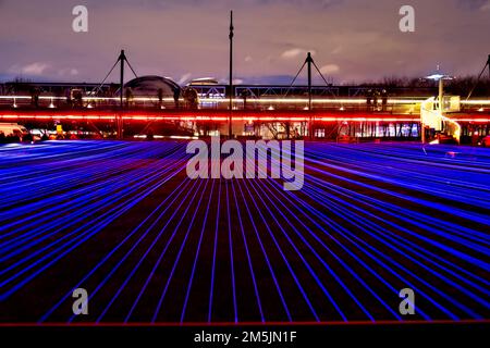 Paris, France. 27th Dec, 2022. Aftereal, moving threads and UV light projections by Yasuhiro Chida (Japan). Stock Photo