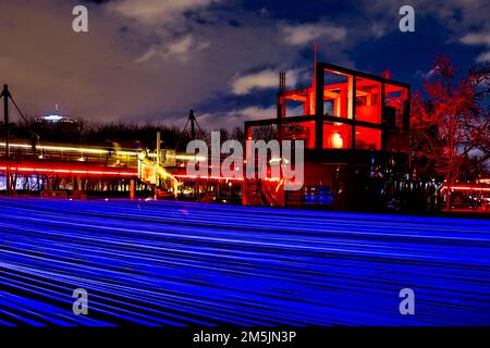 Paris, France. 27th Dec, 2022. Aftereal, moving threads and UV light projections by Yasuhiro Chida (Japan). Stock Photo