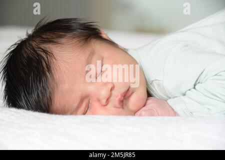 Newborn sleeping Stock Photo