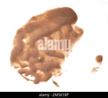 melted chocolate ice cream stain isolated on white background, top view Stock Photo
