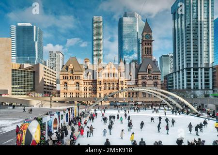 Nathan Phillips Square Skating Rink in downtown Toronto, Ontario, Canada Winter Stock Photo