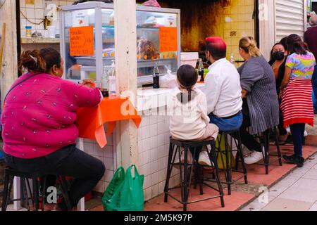 People having lunch in a snack-bar at the Lucas de Galvez Market in the center of Merida, Yucatan, Mexico Stock Photo