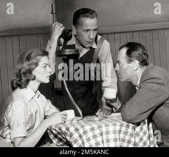 Actors Lauren Bacall, Humphrey Bogart and Henry Fonda in scene from television broadcast play 'Petrified Forest', 1955 Stock Photo