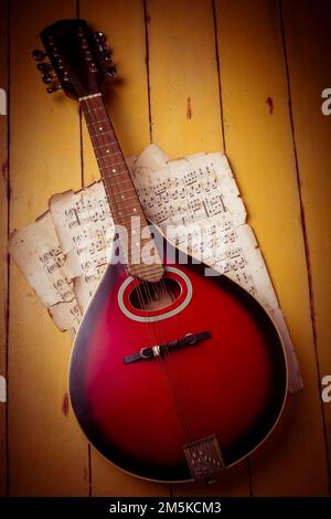 Wonderful Red Violin On Sheet Music Still Life Stock Photo