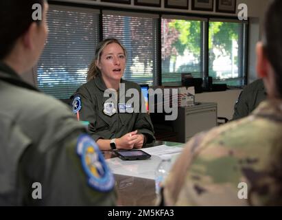 U.S. Air Force 1st Lt. Macy Miller, 6th Air Refueling Squadron KC-10 Extender pilot, delivers the pre-flight briefing prior to the Women’s History Month heritage flight at Travis Air Force Base, California, March 22, 2022. In honor of Women's History Month, an all-female KC-10 flight crew from the 60th and 349th Air Mobility Wings flew on an aerial refueling training mission over California and Oregon. Stock Photo