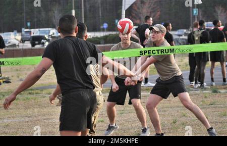 Volleyball players compete during the International Military Training Sports Extravaganza March 22 on the Army Logistics University quad. The purpose of the event, hosted by the International Military Student Office, is to bring attention to IMSO’s sponsorship program that serves to provide students with an American cultural experience. Stock Photo