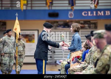 Lt. Col. Adam Armstrong relinquishes command of 2nd Battalion, 22nd Infantry Regiment, 1st Brigade Combat Team, 10th Mountain Division  to Lt. Col. Matthew VanPutte on Fort Drum N.Y., on March 22, 2022. Stock Photo