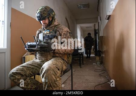 Ukrainian drone operator, Leonid works to correct artillery fire in the city of Bahkmut. Drone operators have become increasingly important as the war pushes into the new year. Stock Photo