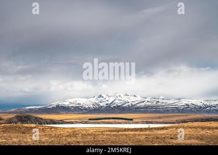 Scenic view of Lake Tekapo east bank. Beautiful view driving along the Lilybank Road from Lake Tekapo Park towards Motuariki View Point. Stock Photo