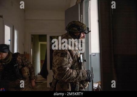 Bahkmut, Ukraine. 29th Dec, 2022. Leonid, laughs as the battery in his drone is replaced. Leonid works as a drone operator for the Ukrainian military, tasked with correcting artillery fire in Bahkmut. (Photo by Madeleine Kelly/SOPA Images/Sipa USA) Credit: Sipa USA/Alamy Live News Stock Photo