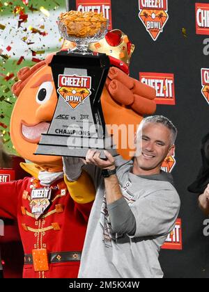 December 29, 2022: Florida State Seminoles head coach Mike Norvell hoist the Cheez-It Trophy. FSU defeated Oklahoma 35-32 at Camping World Stadium in Orlando, FL. Romeo T Guzman/CSM Stock Photo