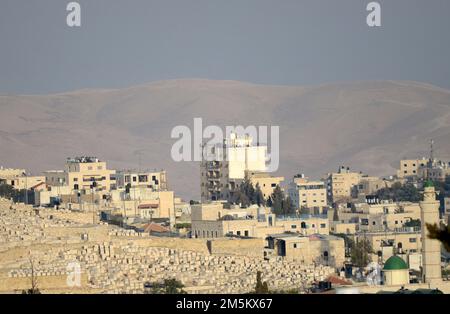 A view of the Palestinian neighborhood of Ras Al-Amud with the Judean desert in the background. East Jerusalem. Stock Photo