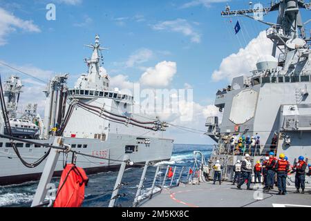 220323-N-UP745-1072 EAST MEDITERRANEAN SEA (March 23, 2022) U.S. Navy Arleigh Burke-class guided-missile destroyer USS Jason Dunham (DDG 109) receives a fuel probe from Italian navy Vulcano-class logistic support ship ITS Vulcano (A-5335) during a replenishment-at-sea, March 23, 2022. Jason Dunham is a part of the Standing NATO Maritime Group Two (SNMG2), one of four standing forces that comprise the maritime component of the Very High Readiness Joint Task Force (VJTF), on a scheduled deployment in the U.S. 6th Fleet area of operations in support of maritime security operations as well as cont Stock Photo