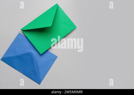 Colorful paper envelopes on light background Stock Photo
