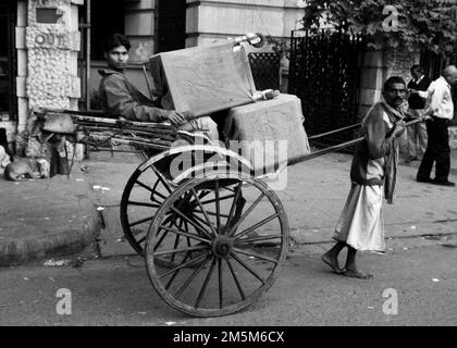 Hand pulled rickshaw in the streets of Kolkata, West Bengal, India. Stock Photo