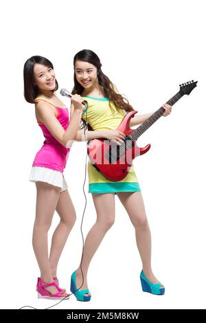 Fashion dynamic young people play the guitar singing Stock Photo