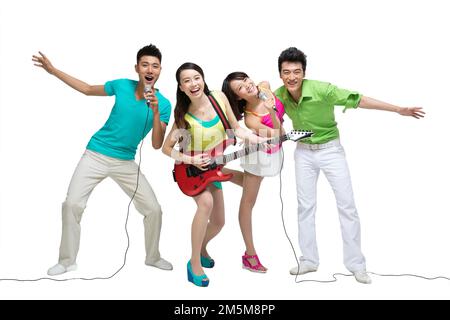 Fashion dynamic young people play the guitar singing Stock Photo