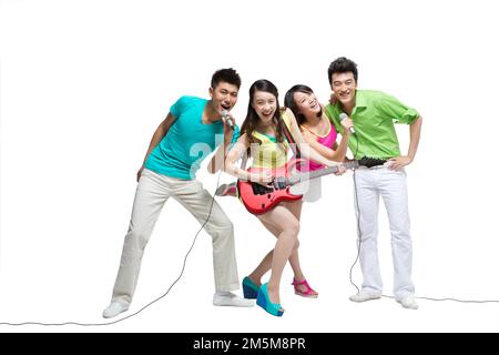 Fashion dynamic young people play the guitar singing Stock Photo