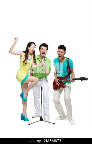 Fashion dynamic young people play the guitar singing Stock Photo