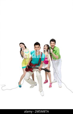 Fashion dynamic young people play the guitar singing Stock Photo