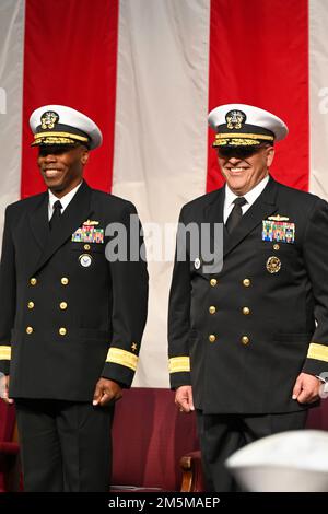 MILLINGTON, Tenn. (March 25, 2022) Rear Adm. Dennis Velez, commander, Navy Recruiting Command, right, stands on stage with Rear Adm. Alexis “Lex” Walker during the 2022 Navy Recruiting Command (NRC) Change of Command ceremony in Millington, March 25. The goal of NRC is to attract the highest quality candidates to assure the ongoing success of America’s Navy. Stock Photo