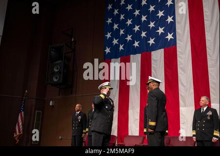 MILLINGTON, Tenn. (March 25, 2022) Rear Adm. Alexis “Lex” Walker, commander, Navy Recruiting Command, right, salutes Rear Adm. Dennis Velez during the 2022 Navy Recruiting Command (NRC) Change of Command ceremony in Millington, March 25. The goal of NRC is to attract the highest quality candidates to assure the ongoing success of America’s Navy. Stock Photo