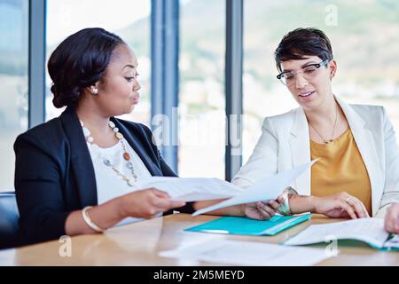 Weve got two options...corporate businesspeople meeting in the boardroom. Stock Photo