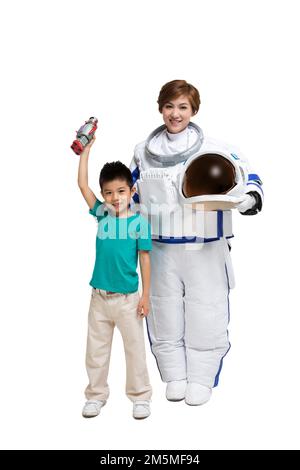 Shed the astronaut and the little boy Stock Photo