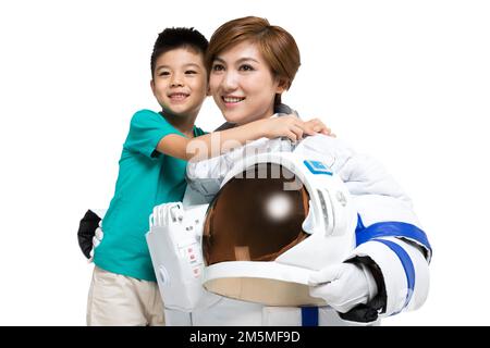 Shed the astronaut and the little boy Stock Photo