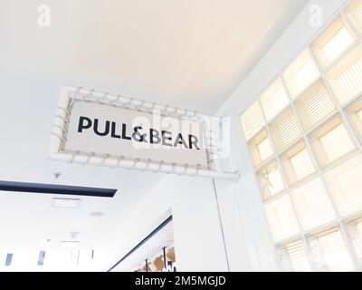 Yerevan, Armenia, December 17, 2022: Pull&Bear store in shopping mall. The sign for Pull&Bear store. Pull & Bear logo brand and text sign front wall Stock Photo