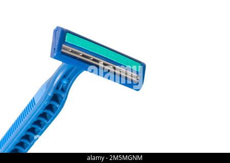 Blue disposable razor blade isolated on white background. Single use razor blade. Disposable shaving razor. Stock Photo