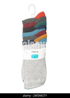 Stack of socks with different lines isolated on white background. Colorful socks son white background. Colored socks heap isolated on white background Stock Photo