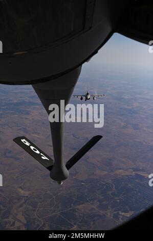 An F-16 from the 301st Fighter Wing, Naval Air Station Joint Reserve Base Fort Worth, Texas, prepares to receive fuel from a KC-135 Stratotanker from the 507th Air Refueling Wing March 25, 2022, at Tinker Air Force Base, Oklahoma. Stock Photo