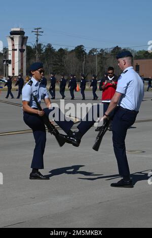 The Beaufort High School ‘Fancy Duet Armed’ team from Beaufort, South Carolina competes during the annual Top Gun Drill Meet at McEntire Joint National Guard Base, South Carolina, March 26, 2022. High School Junior Reserve Officers Training Corps cadets from twenty high schools from across the state competed in twelve drill and ceremony events sponsored by the South Carolina Air National Guard. Stock Photo