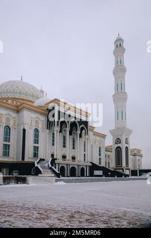 Panoramic view of snow-white modern Hazaret Sultan mosque early morning, Nur-Sultan, Astana, Kazakhstan. High quality photo Stock Photo